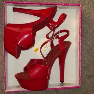 Brand new red platform heels with tags